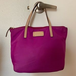 Kate Spade shoulder bag with dot pattern.